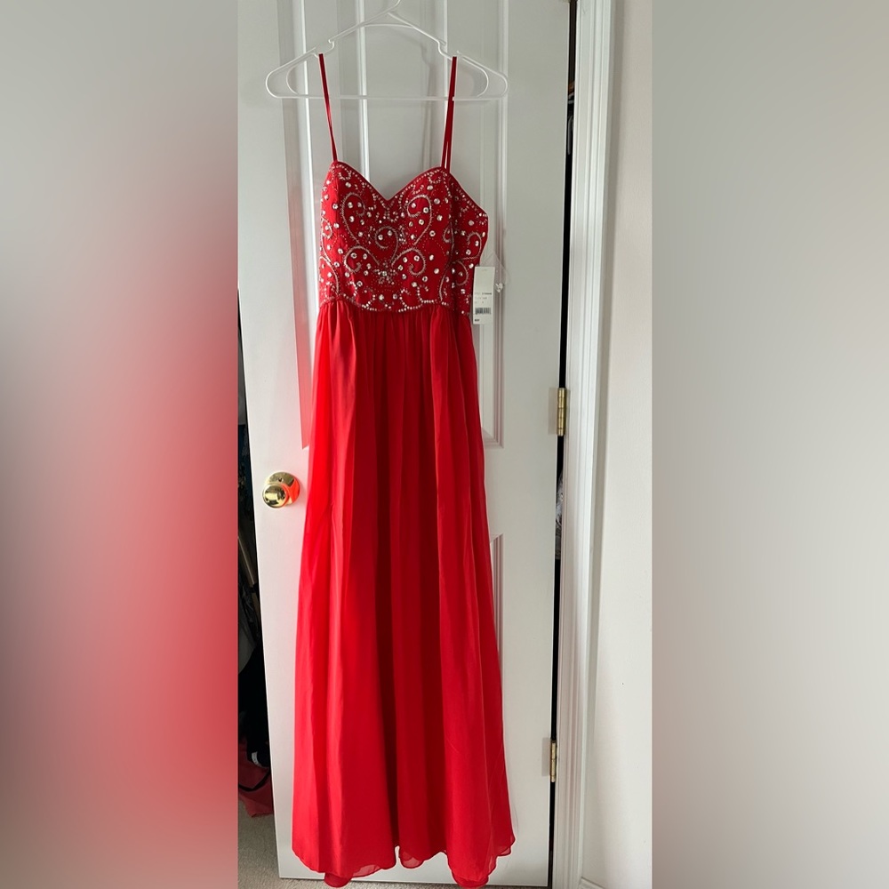 Stunning red dress.  Never altered   New with tags